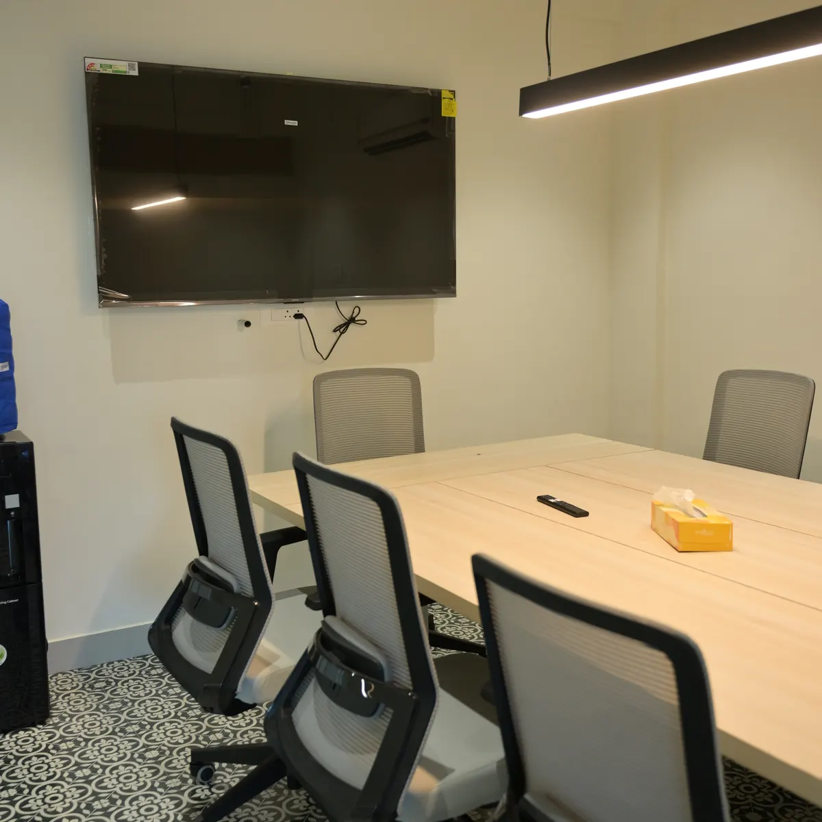 Conference table with presentation screen